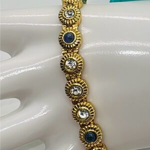 Gold tone bracelet with cz’s & Iolite